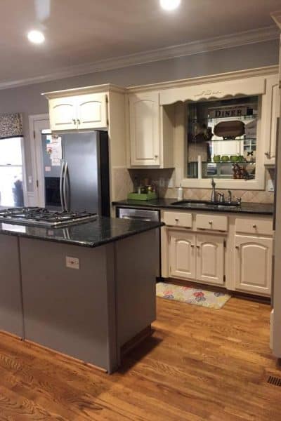 Our DIY Kitchen Remodel. We took our 90's kitchen with oak cabinets and updated it and now it is white, bright, and beautiful.